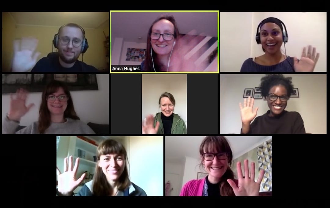 Eight members of the flight free UK team wave at the camera. This is a screen shot of a Zoom call
